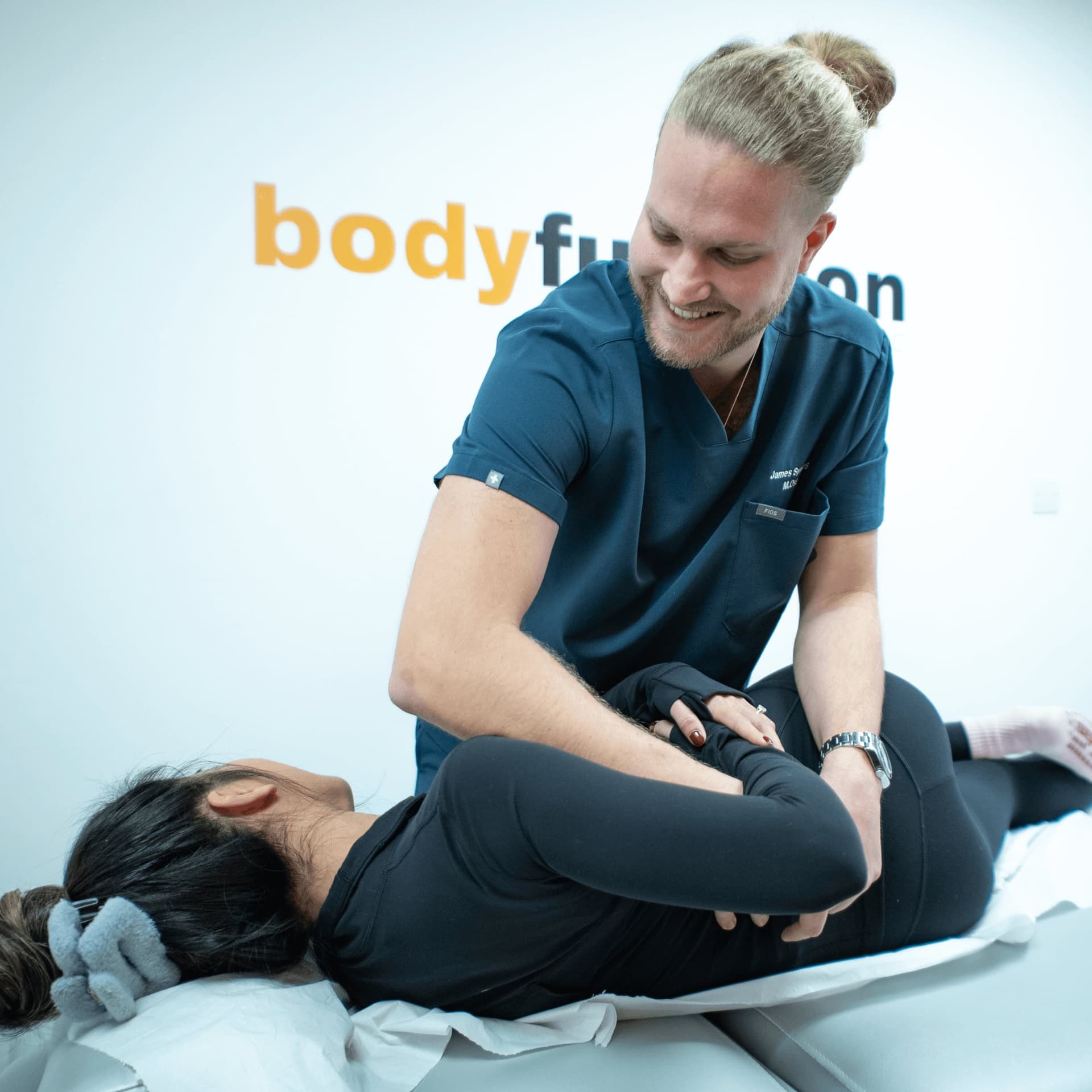 Osteopath in Islington conducting initial assessment at Bodyfunction Clinic