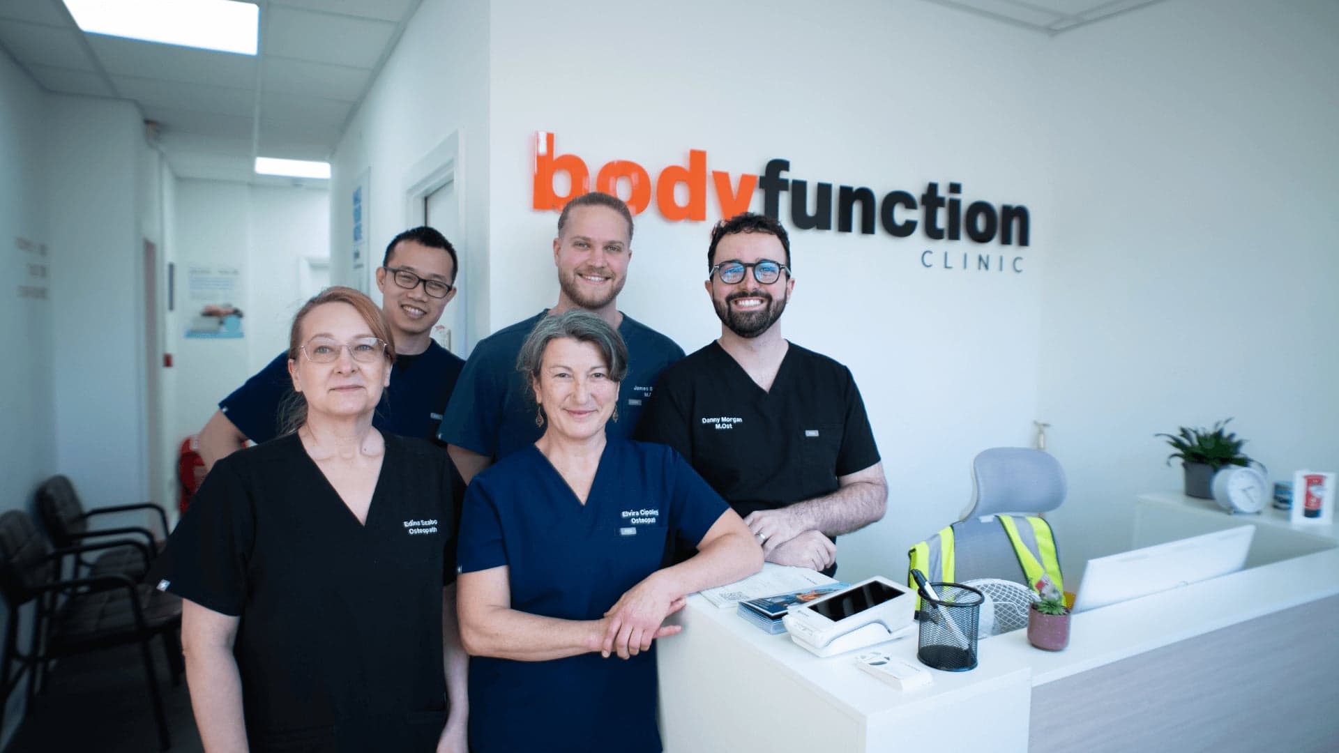 Bodyfunction Clinic Islington team at reception welcoming patients