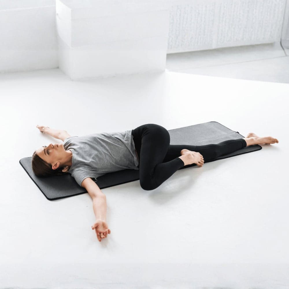 Physiotherapy thoracic rotation stretch used in back pain treatment
